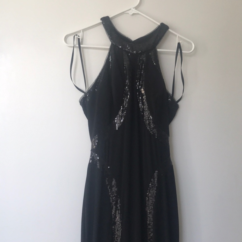 Black, floor length Xscape gown. Size 6. NWOT